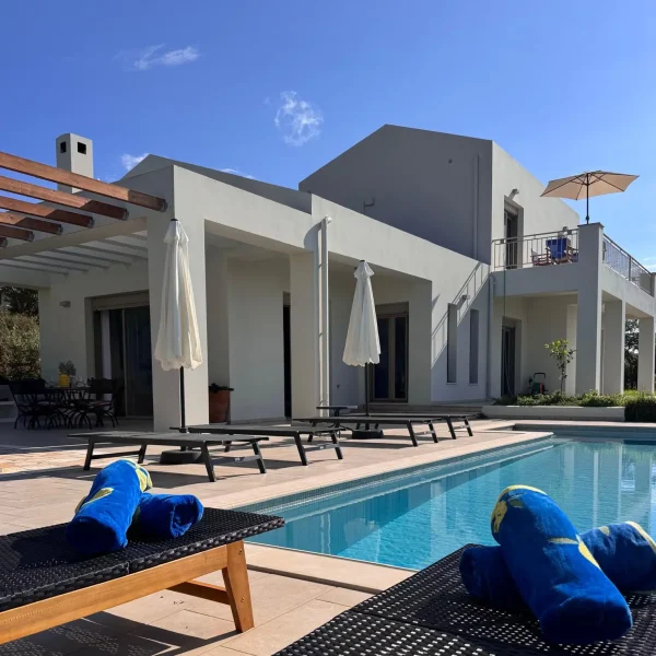 Image depicting a view from the sunbeds towards the villa