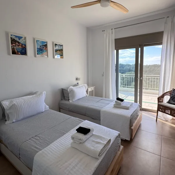 Image depicting one of the bedrooms on the upper floor